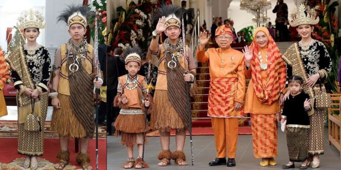 Putra sulung Presiden Joko Widodo (Jokowi), sekaligus Wakil Presiden Terpilih, Gibran Rakabuming (kiri) saat mengenakan pakaian adat Papua di Upacara HUT ke-79 Kemerdekaan RI, 17 Agustus 2024.