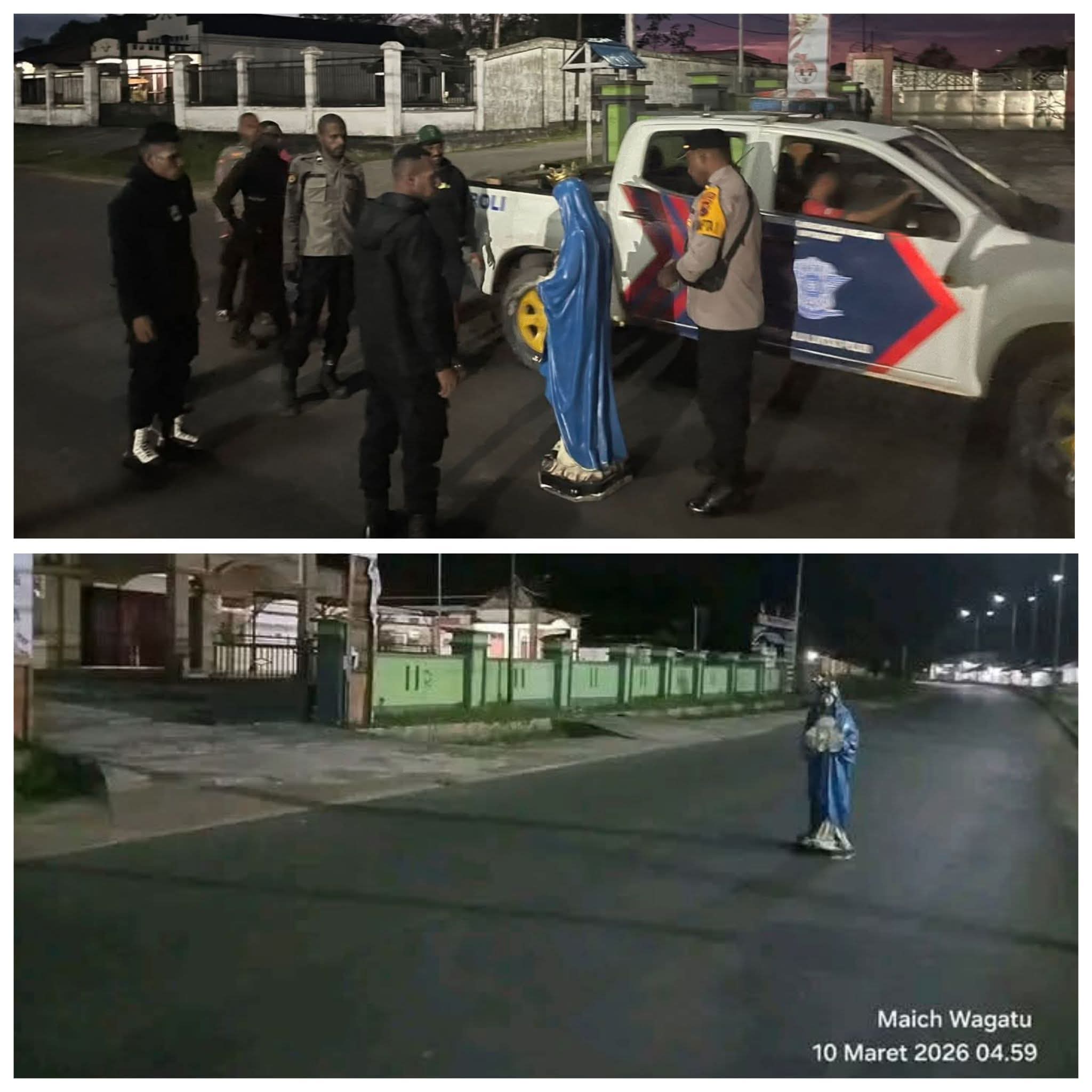 Patung Bunda Maria yang berdiri di tengah jalan.