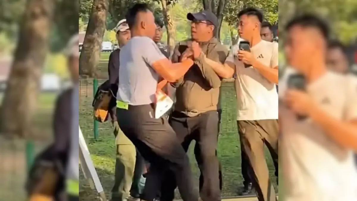 Potongan gambar Brigjend Yuniar (kiri) saat menarik ajudannya namun ditahan panitia dalam event Mandiri Jogja Marathon, Minggu (21/6/2026) - (Screenshoot)