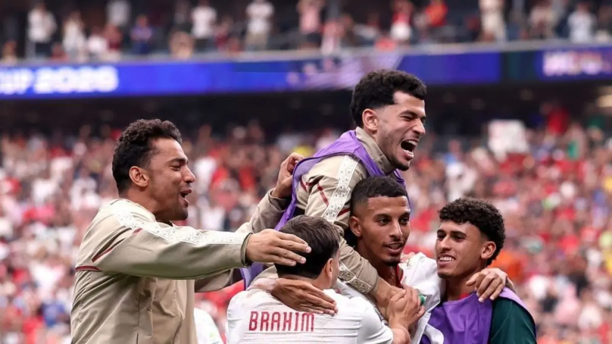 Selebrasi pemain-pemain Maroko usai mengalahkan tuan rumah Kanada 3-0 di Stadion Houston Stadium, Amerika Serikat, Minggu &nbsp;(5/7/2026). Maroko menjadi tim pertama yang lolos ke babak perempat final Piala Dunia 2026. (x) 