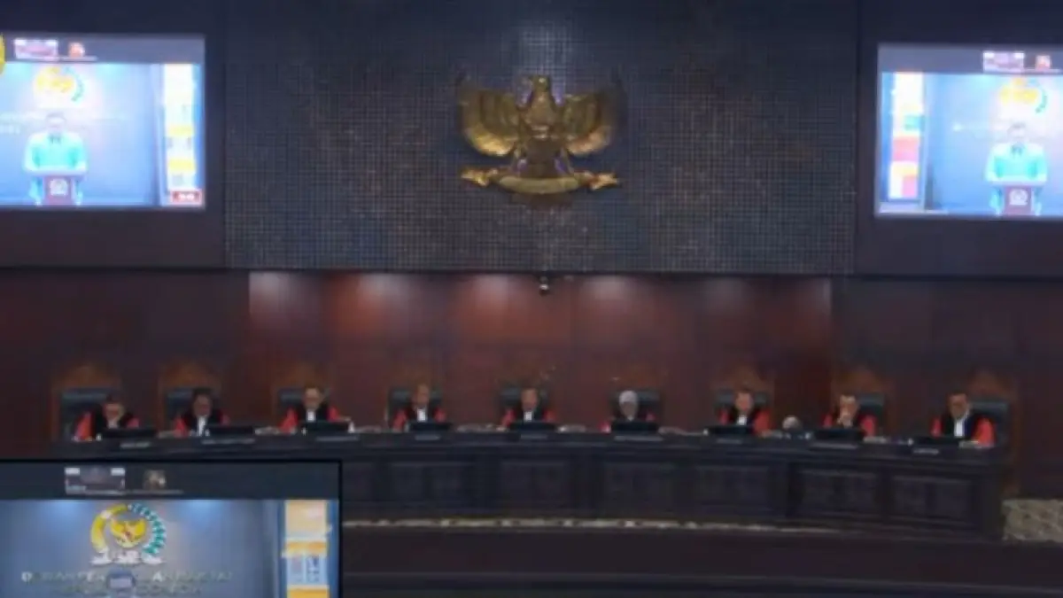 Tangkapan layar - Kuasa hukum DPR RI Martin Daniel Tumbelaka membacakan keterangannya dalam sidang pengujian materiil Undang-Undang Penerbangan secara daring di Ruang Rapat Utama Gedung Mahkamah Konstitusi, Jakarta, Senin (20/7/2026). (ANTARA/HO-YouTube Mahkamah Konstitusi)