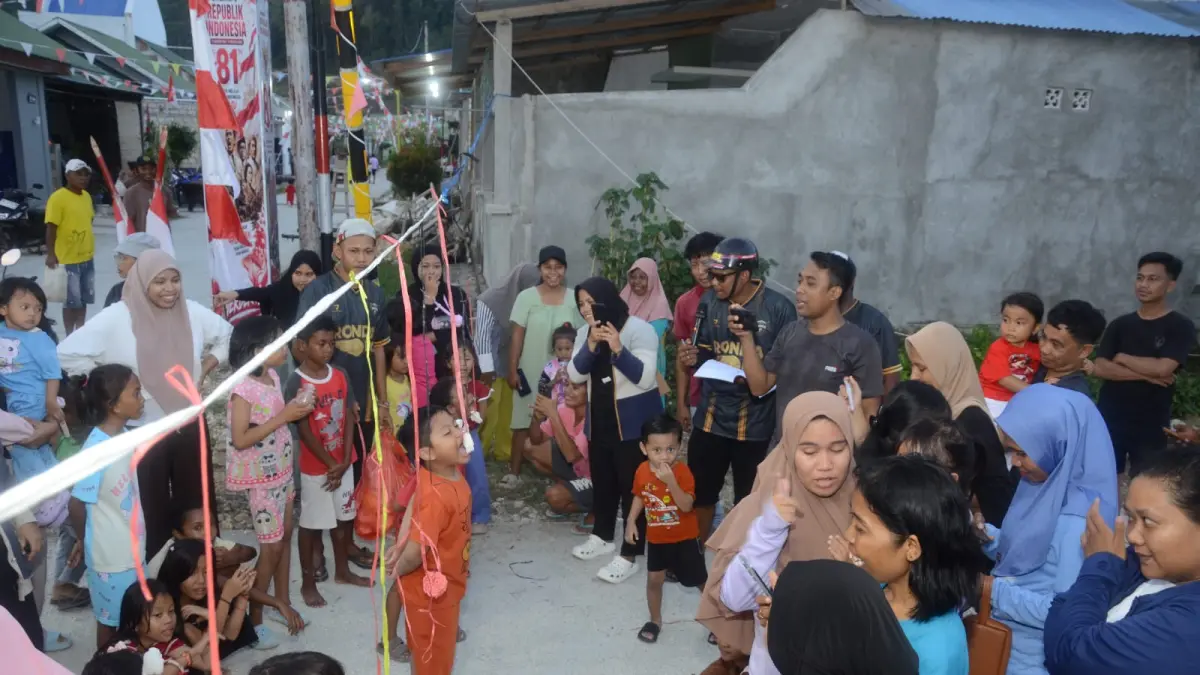 Keterangan Foto: Kemeriahan warga Blok F 6-7 Kompleks Perumahan Rollo Green Distrik Muara Tami, Sabtu (15/8/2026).(Istimewah/CEPOSONLINE.COM)