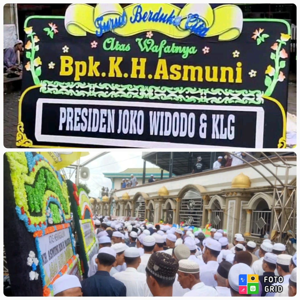 DARI JOKOWI: Salah satu karangan bunga tertulis atas nama Presiden Joko Widodo dan Keluarga di sekitar kediaman Guru Danau.(Foto: M Akbar/Radar Banjarmasin)