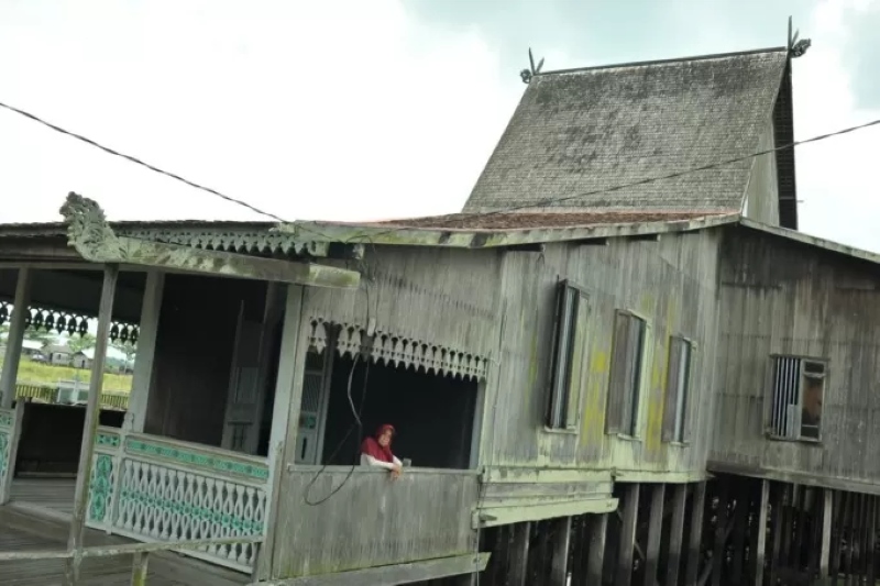 CAGAR BUDAYA: Rumah adat Banjar di Teluk Selong, Kabupaten Banjar ini merupakan salah satu cagar budaya yang ada di Kalimantan Selatan. | FOTO: M SYARAFUDDIN/RADAR BANJARMASIN