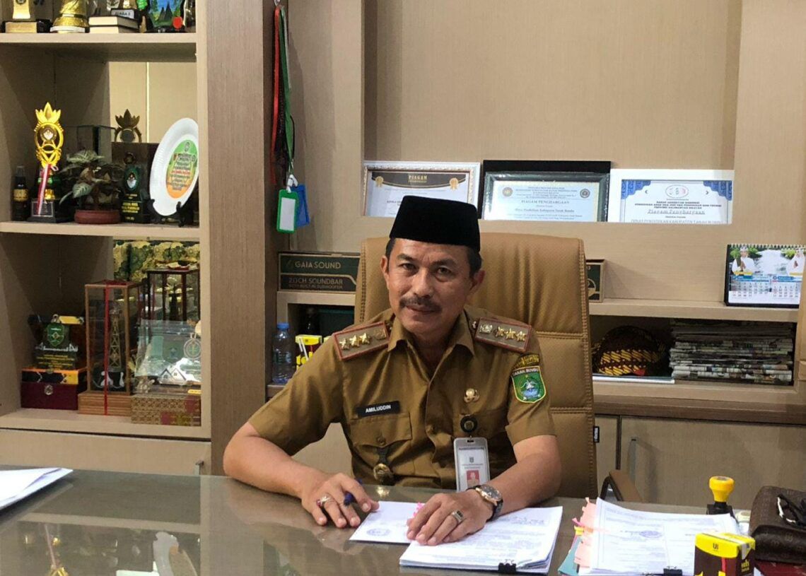 Kepala Dinas Pendidikan (Disdik) Kabupaten Tanah Bumbu (Tanbu), Amiludin.(foto:Zulqarnain/Radar Banjarmasin)