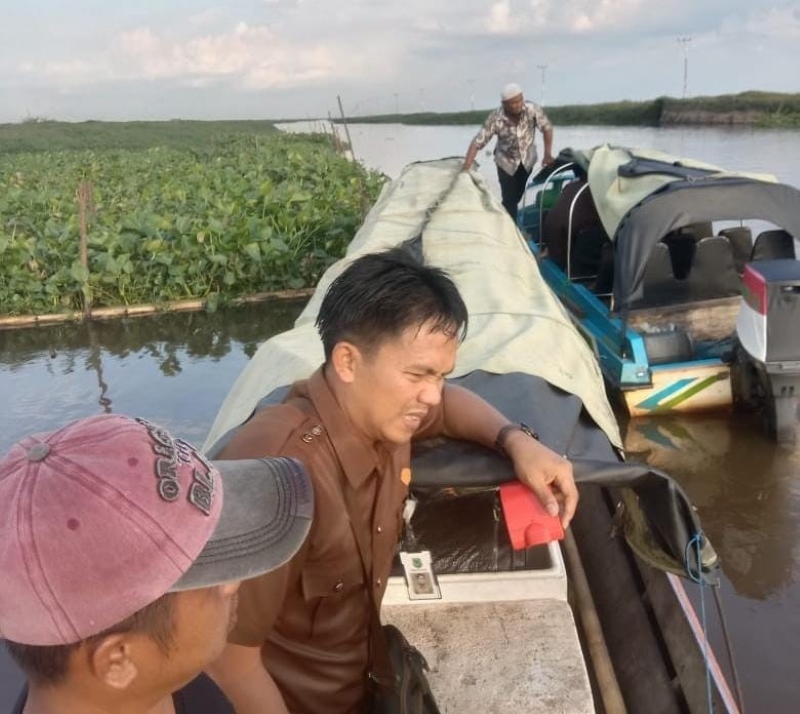 SELAMAT: Rombongan speedboat dokter hewan dari Dinas Pertandingan Kabupaten Hulu Sungai Utara, alami insiden di perairan rawa, Kecamatan Paminggir, Kabupaten HSU.