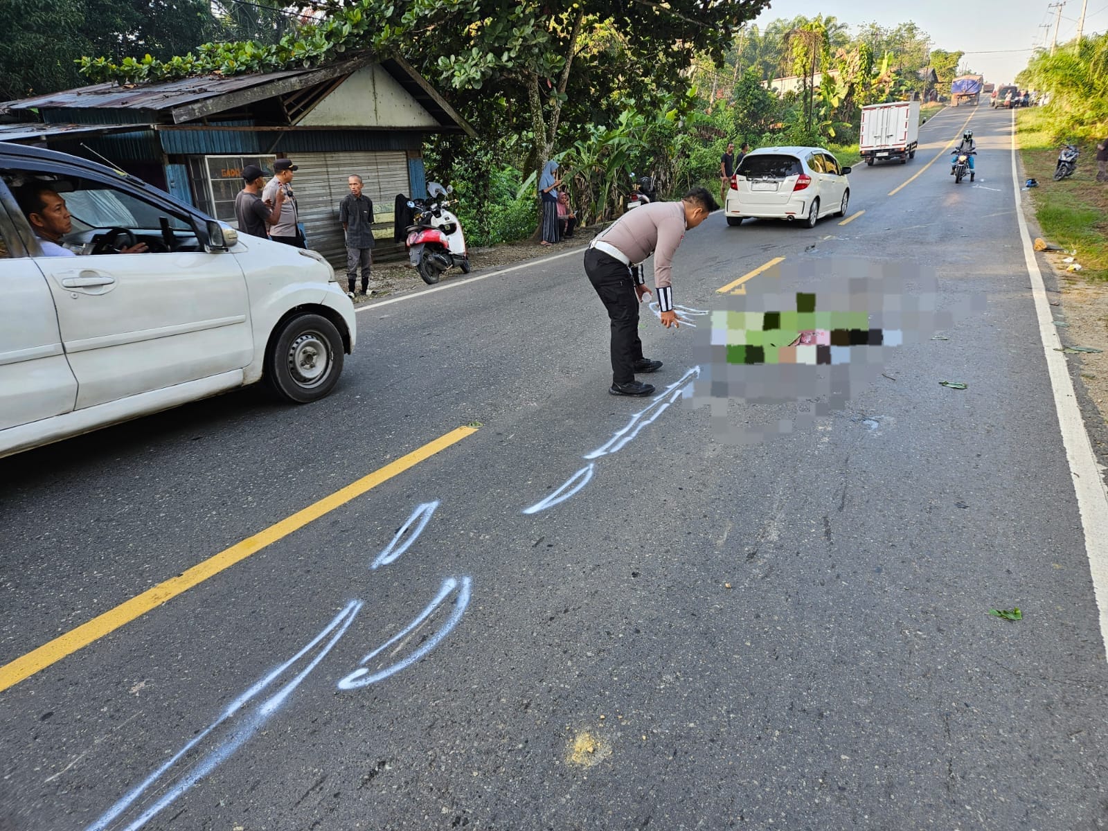 LAKALANTAS:Satlantas Polres Tabalong mengidentifikasi kecelakaan di Desa Kasiau, Kecamatan Murung Pudak, Kabupaten Tabalong, Kamis (12/9/2024).(Foto:Polres Tabalong untuk Radar Banjarmasin)