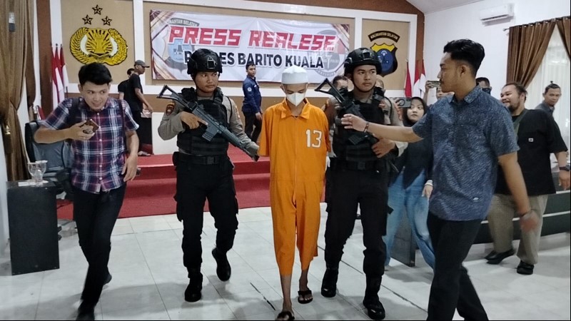 TERTUNDUK: MF ditetapkan sebagai tersangka setelah melakukan persetubuhan terhadap anak di bawah umur dan terancam kurungan 5 hingga 15 tahun penjara.