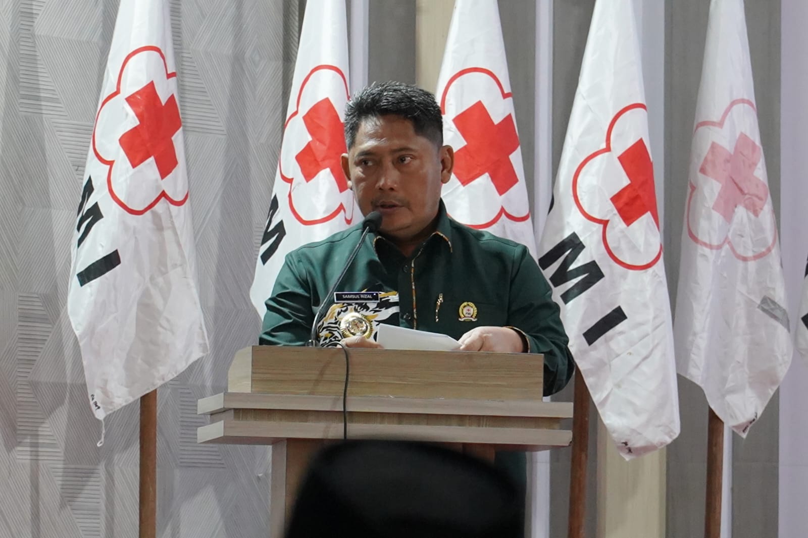 SAMBUTAN:Bupati HST, Samsul Rizal menyampaikan sambutan dalam acara pelantikan PMI HST, Minggu (13/7/2025).