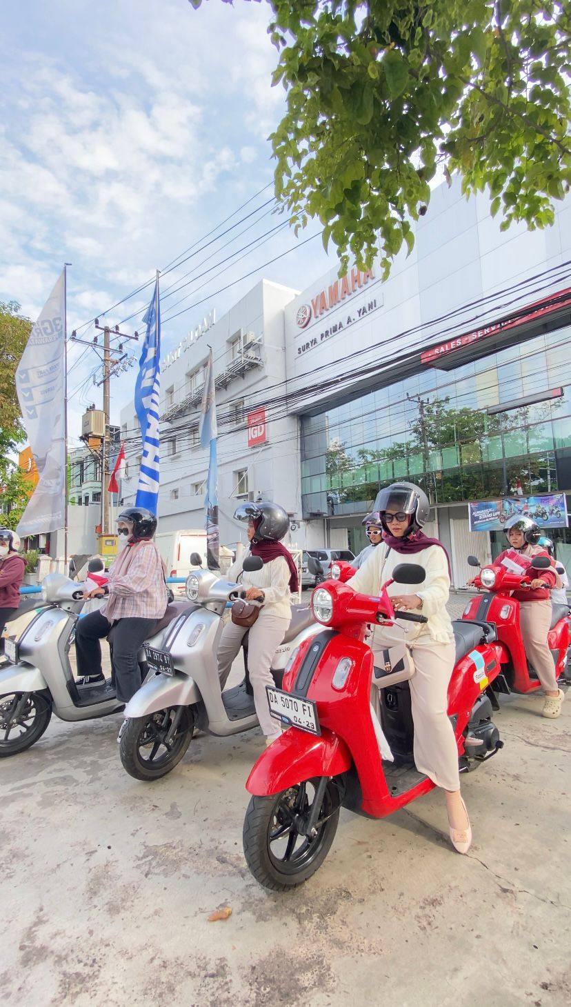 ROLLING CITY:Para peserta Fazzio Hybrid Movement (FOMO) berkeliling Kota Banjarmasin mengendarai Yamaha Fazzio dan Grand Filano, Minggu (24/8/2025).