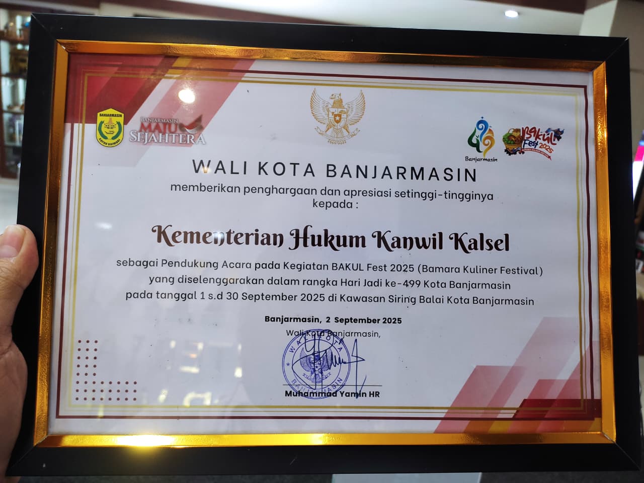APRESIASI:Kanwil Kemenkum Kalsel meraih penghargaan atas dukungannya terhadap event Bakul Fest 2025.