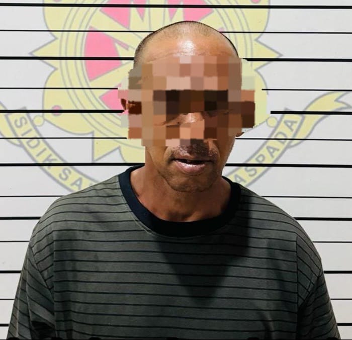 DIAMANKAN: Ayah kandung yang diduga memegang alat kelamin anaknya.