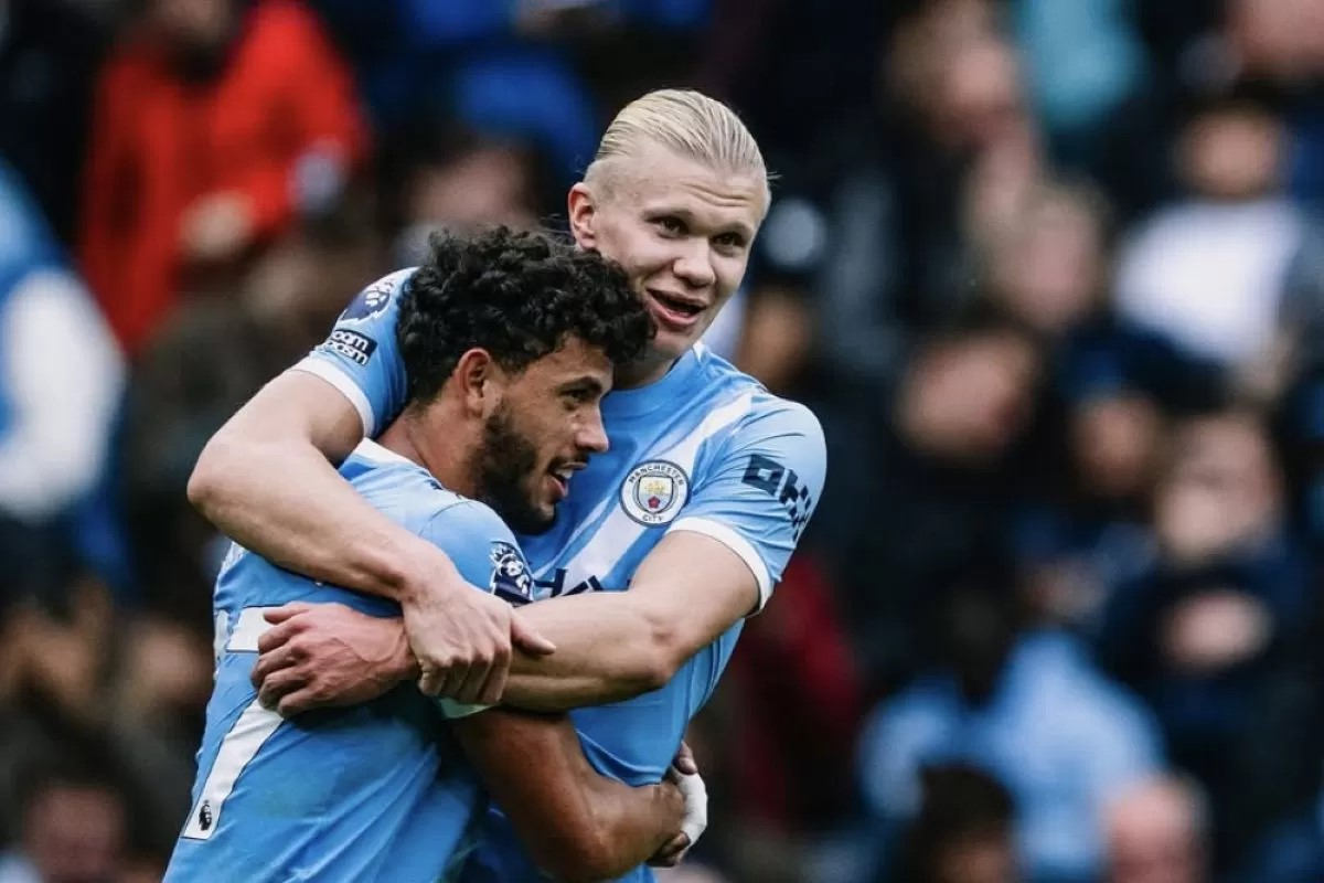MENANG: Erling Haaland cetak dua gol saat Manchester City menang lima gol atas Burnley, Sabtu (27/9).