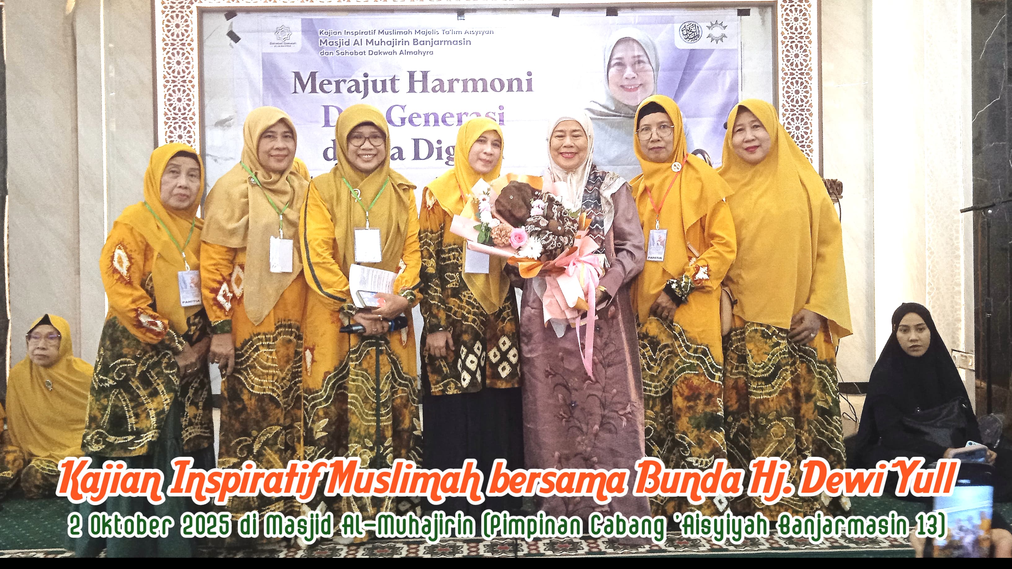 Panitia berfoto bersama dengan Dewi Yull