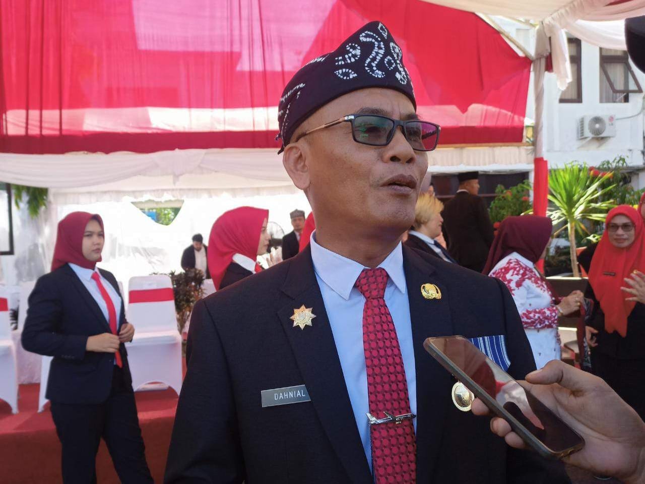 TUTUP USIA : Penampakan rumah duka H Dahnial Kifli di Jalan Almanar II Pelaihari. (Foto : Norsalim Yahya/Radar Banjarmasin)