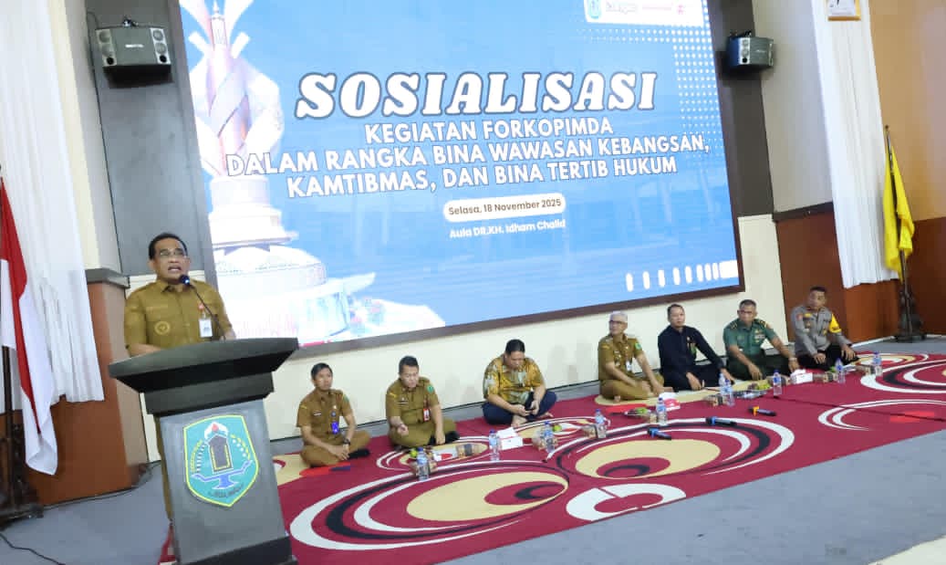 MOMEN:Bupati HSU, H Sahrujani hadiri dialog Wasbang dan tertib hukum di Aula Dr KH Idham Chalid, Selasa (18/11/2025).