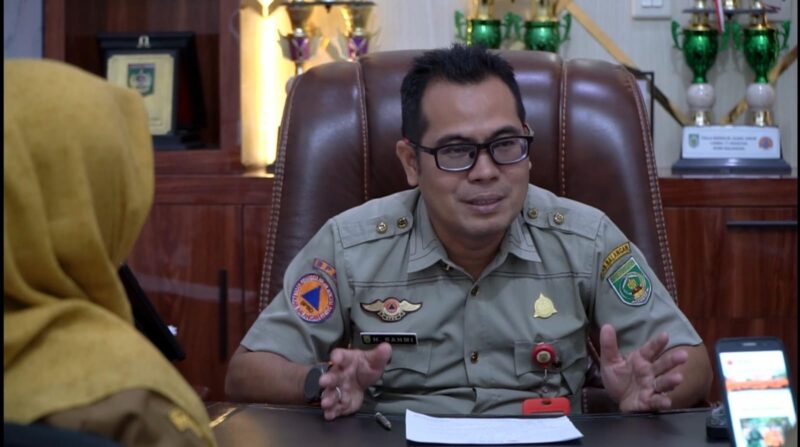 Kepala Pelaksana (Kalak) BPBD Balangan, H Rahmi saat menjelaskan imbauan. (El untuk Radar Banjarmasin)