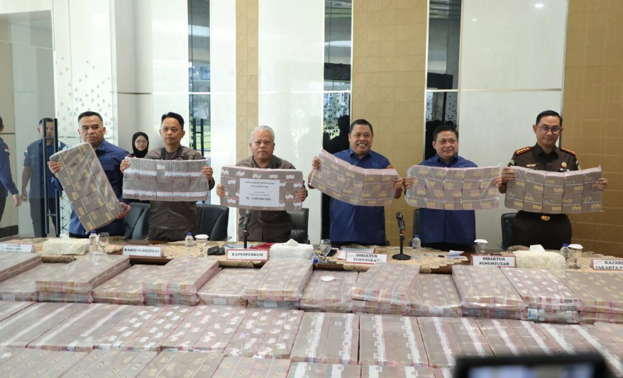 ILUSTRASI: Kejagung menunjukkan barang bukti uang tunai ratusan miliar yang disita dari TPPU kasus Duta Palma.