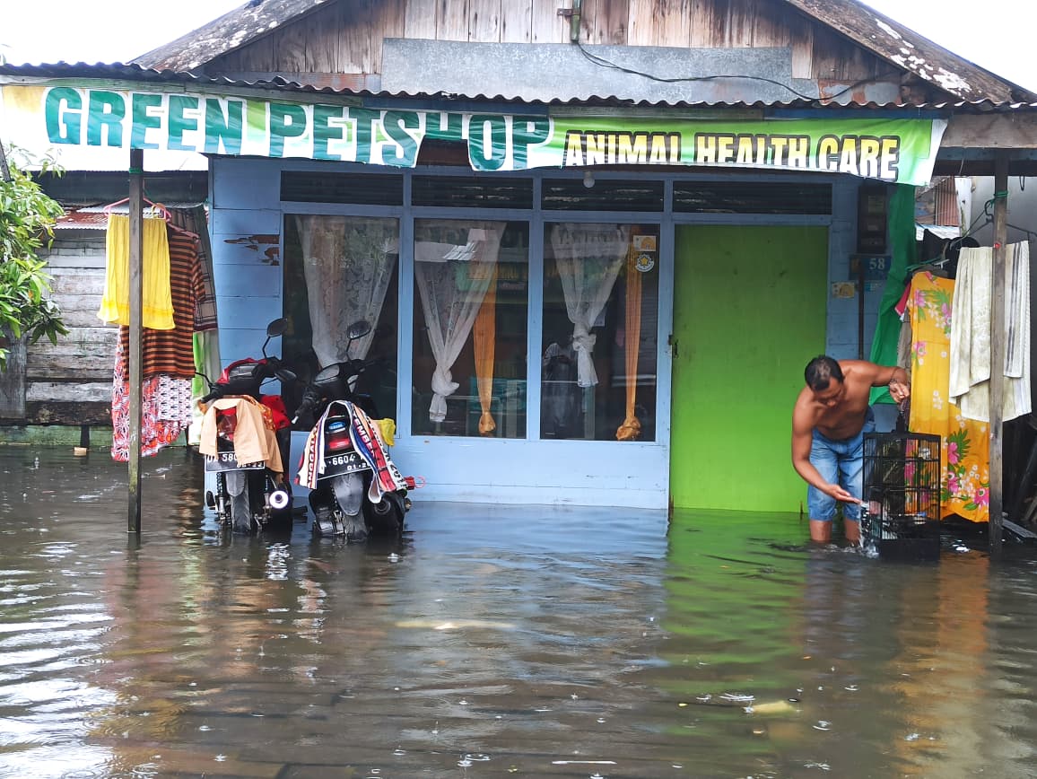 TERENDAM: Kondisi genangan rob yang merendam permukiman penduduk di Kelurahan Pemurus Dalam, Kota Banjarmasin beberapa waktu lalu.