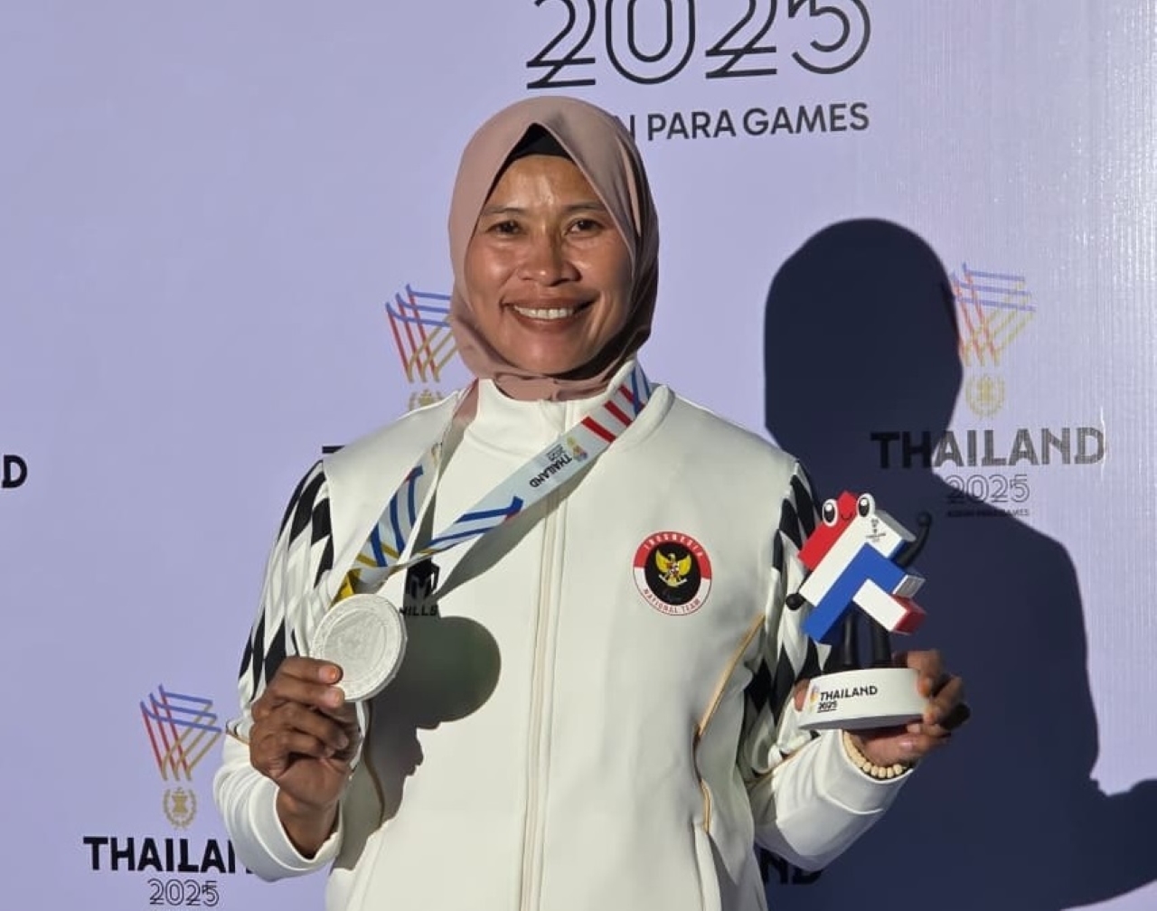 MEDALI: Warmiya saat meraih medali di ajang internasional, Asean Para Games 2025.