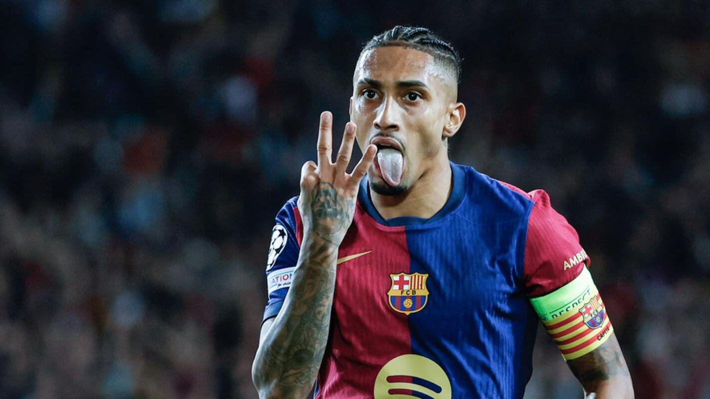 MENCETAK GOL: Selebrasi pemain Barcelona, Raphinha setelah mencetak gol ke gawang Sevilla. (AFP)