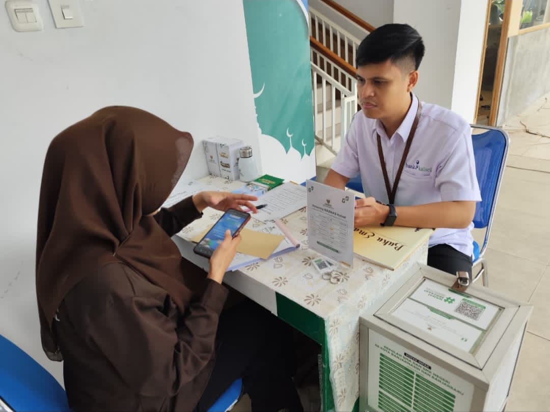 MUDAH: Bayar Zakat Fitrah semakin mudah lewat Bank Kalsel.