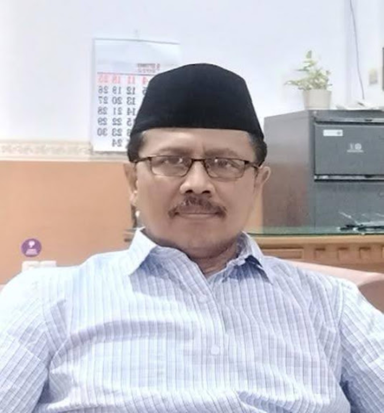 H. Asmu&rsquo;i Syarkowi