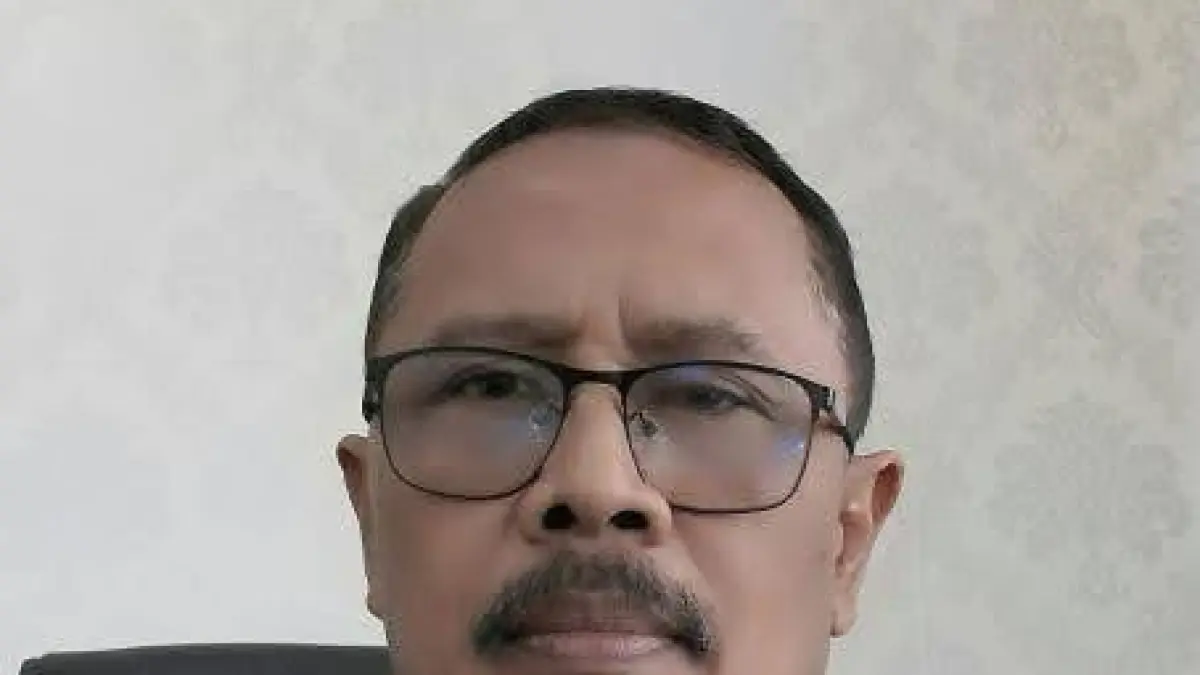 H. Asmu’i Syarkowi