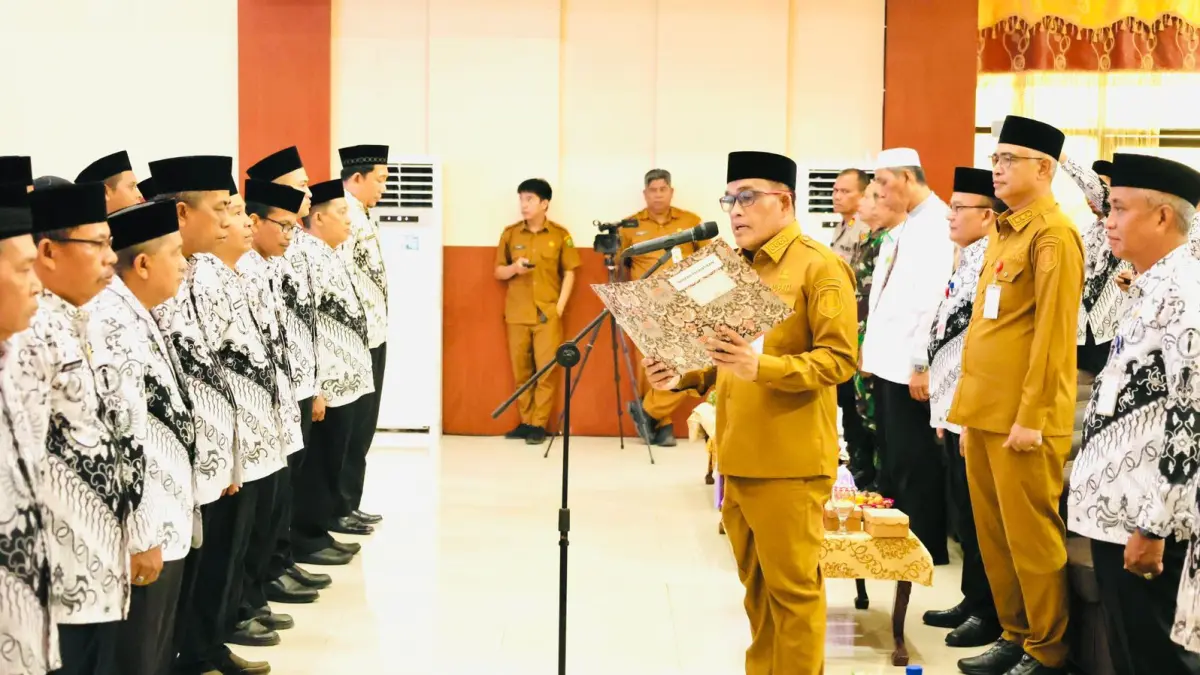 MOMEN:Bupati dan Wakil Bupati Kabupaten HSU, H Sahrujani dan Hero Setiawan menghadiri pelantikan pengurus PGRI cabang HSU dan cabang khusus se-Kabupaten HSU masa bakti 2025–2030.(Foto:M Akbar/Radar Banjarmasin)