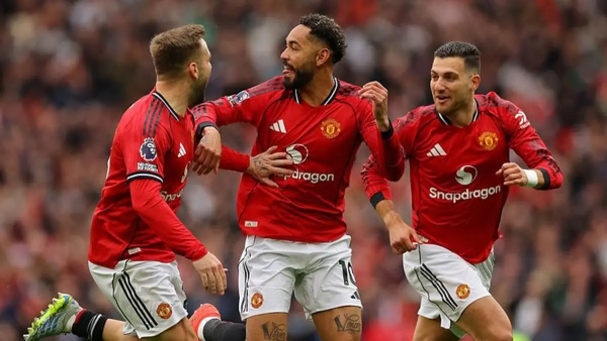 BERHASIL: Manchester United berhasil mengamankan tempat di Liga Champions 2026-2027 usai mengalahkan Liverpool 3-2 pada pekan ke-35 Liga Inggris 2025-2026, Minggu (3/5) malam WIB.&nbsp;
(AFP)&nbsp;