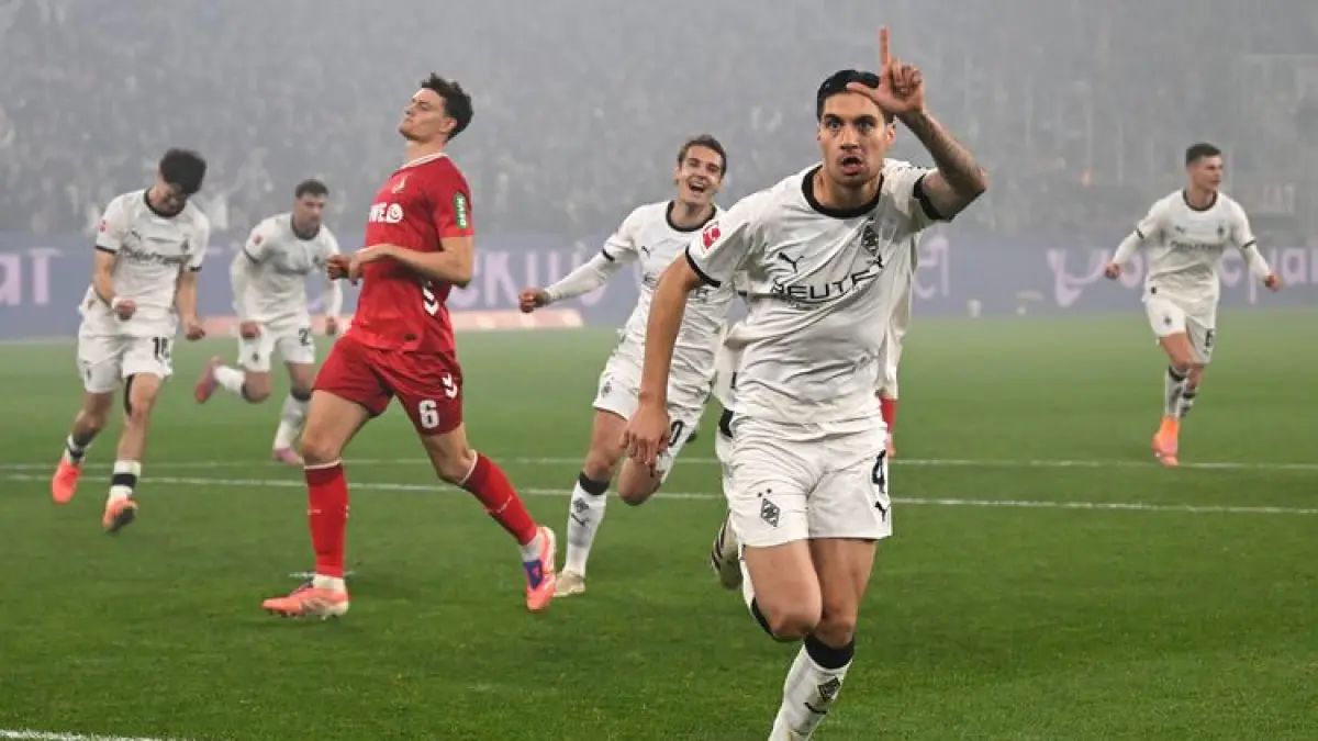 CETAK GOL: Kevin Diks merayakan gol saat membela klub Bundesliga, Borussia Moenchengladbach.
(XinHua/Ulrich Hufnagel)