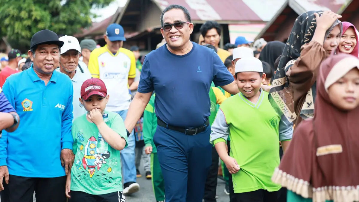 MERIAH: Bupati HSU, H Sahrujani saat hadir dalam jalan dan senam sehat di wilayah Kecamatan Sungai Tabukan, Sabtu (23/5/2026).(Foto: Pemkab HSU)&nbsp;