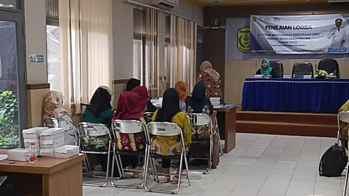PROGRAM: Penilaian Lomba Institusi Masyarakat Perkotaan (IMP) Tingkat Kota Banjarmasin 2026, belum lama tadi. Kader IMP dinilai menjadi ujung tombak keberhasilan program KB dan pembangunan keluarga di masyarakat.(Foto: Endang Syarifuddin/Radar Banjarmasin)