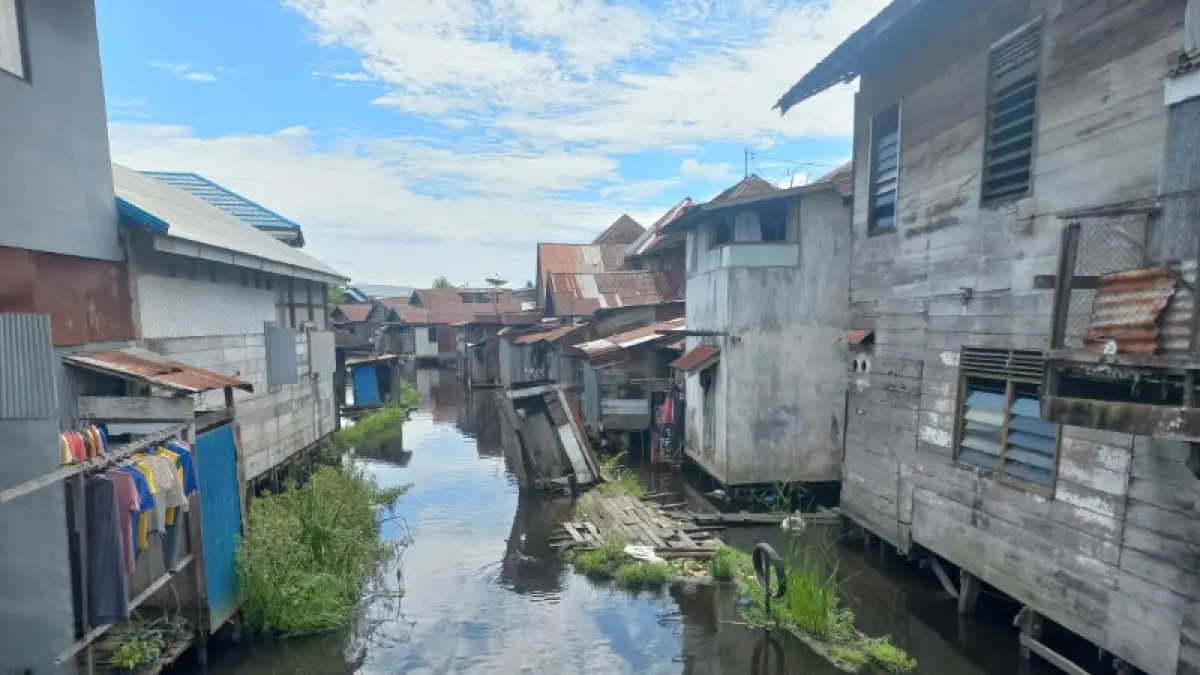 SUNGAI: Sungai Kelayan Banjarmasin yang dikepung permukiman dan jamban apung.(Dok. Radar Banjarmasin)