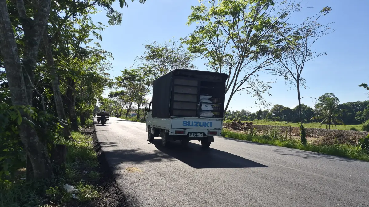 MULUS: Penampakan Jalan Lingkar Kapar-Walangsi di HST yang telah diaspal lagi. (Foto: Jamaluddin/Radar Banjarmasin)