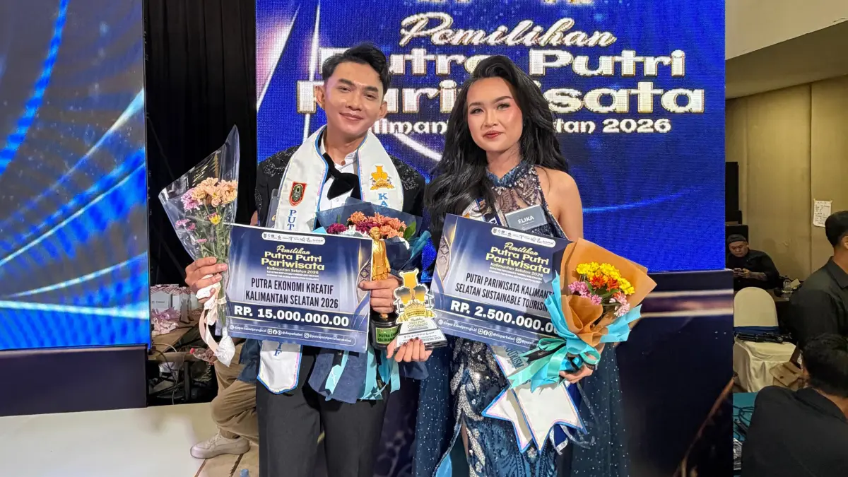 BIKIN BANGGA: Perwakilan Kotabaru, Ahmad Rizani dan Elika Nor Azizah, sukses memboyong gelar juara Pemilihan Putra Putri Pariwisata Kalsel 2026. (Foto: IDWBS untuk Radar Banjarmasin)&nbsp;