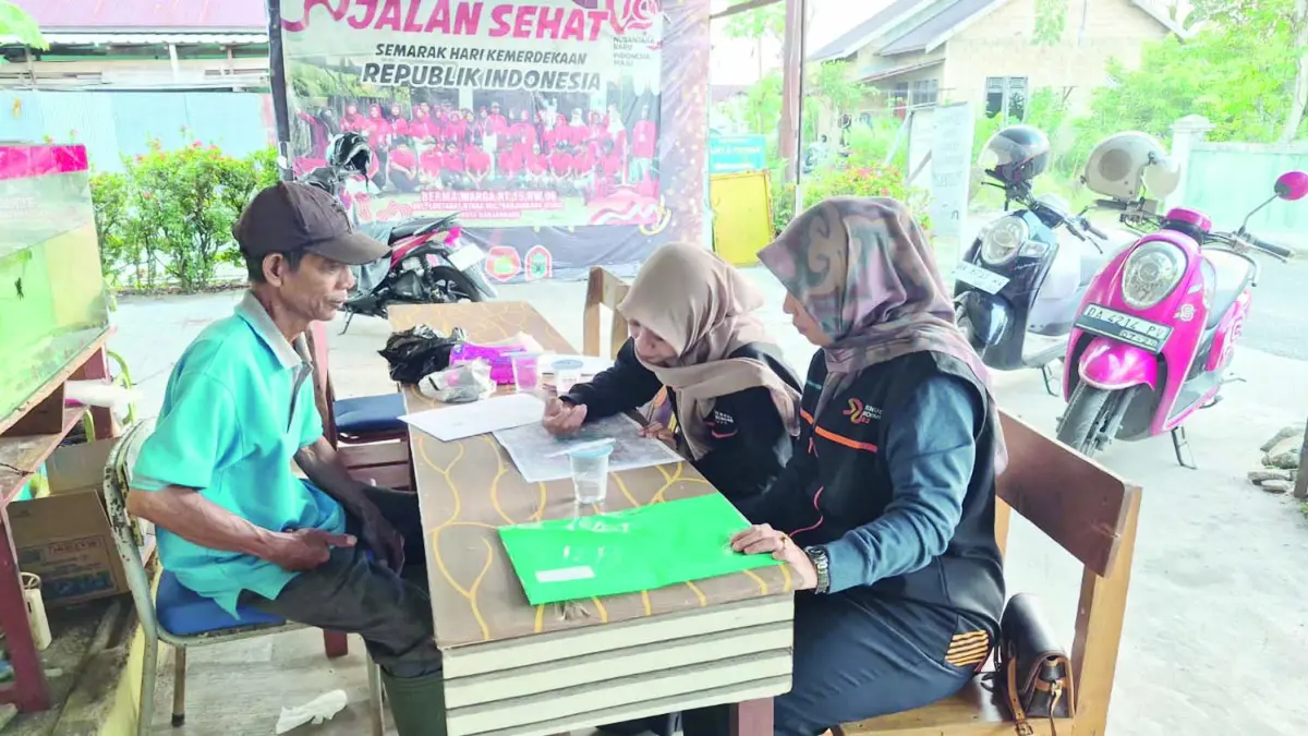 PENDATAAN: Normadina saat melakukan pendataan Sensus Ekonomi 2026.