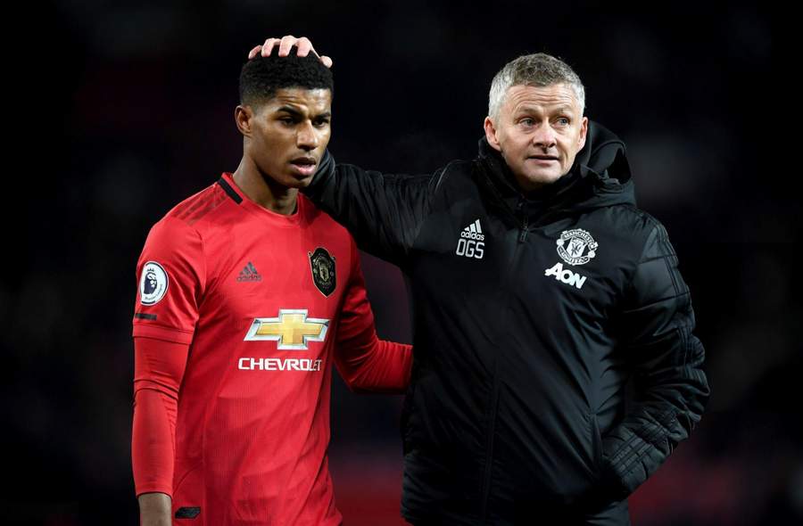 TETAP PERHATIAN: Ole Gunnar Solskjaer saat masih bekerja sama dengan Marcus Rashford.