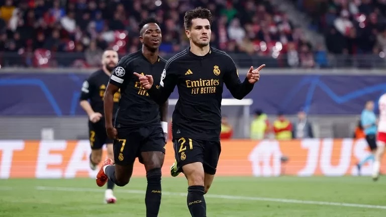 Brahim Diaz dan Vinicius merayakan gol saat menghadapi RB Leipzig./Realmadrid.com