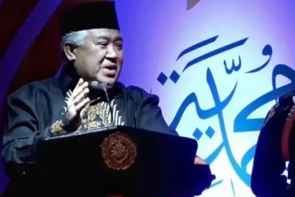 Din Syamsuddin, tokoh Muhammadiyah, saat mengklarifikasi bahwa jumlah utang pemerintah kepada Muhammadiyah bukanlah 350 miliar rupiah seperti yang beredar. (YouTube/tvMU Channel)