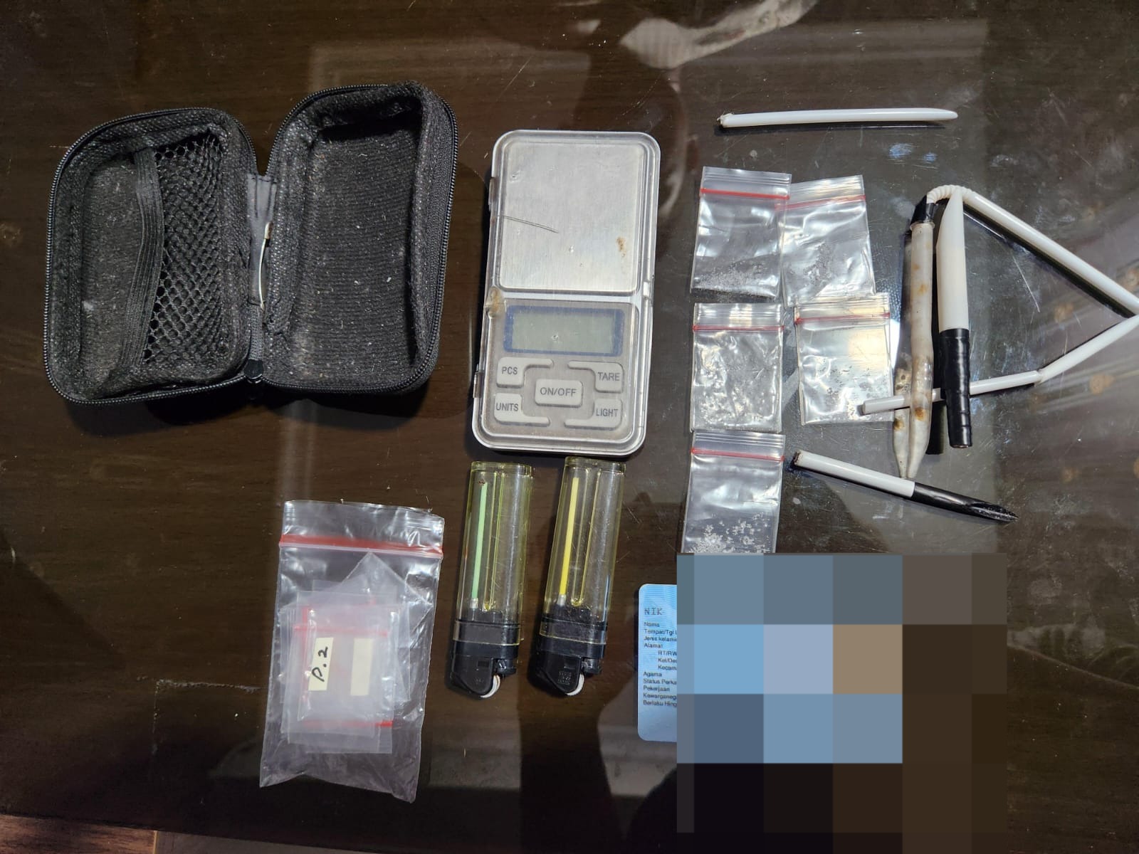 Barang bukti yang disita polisi.