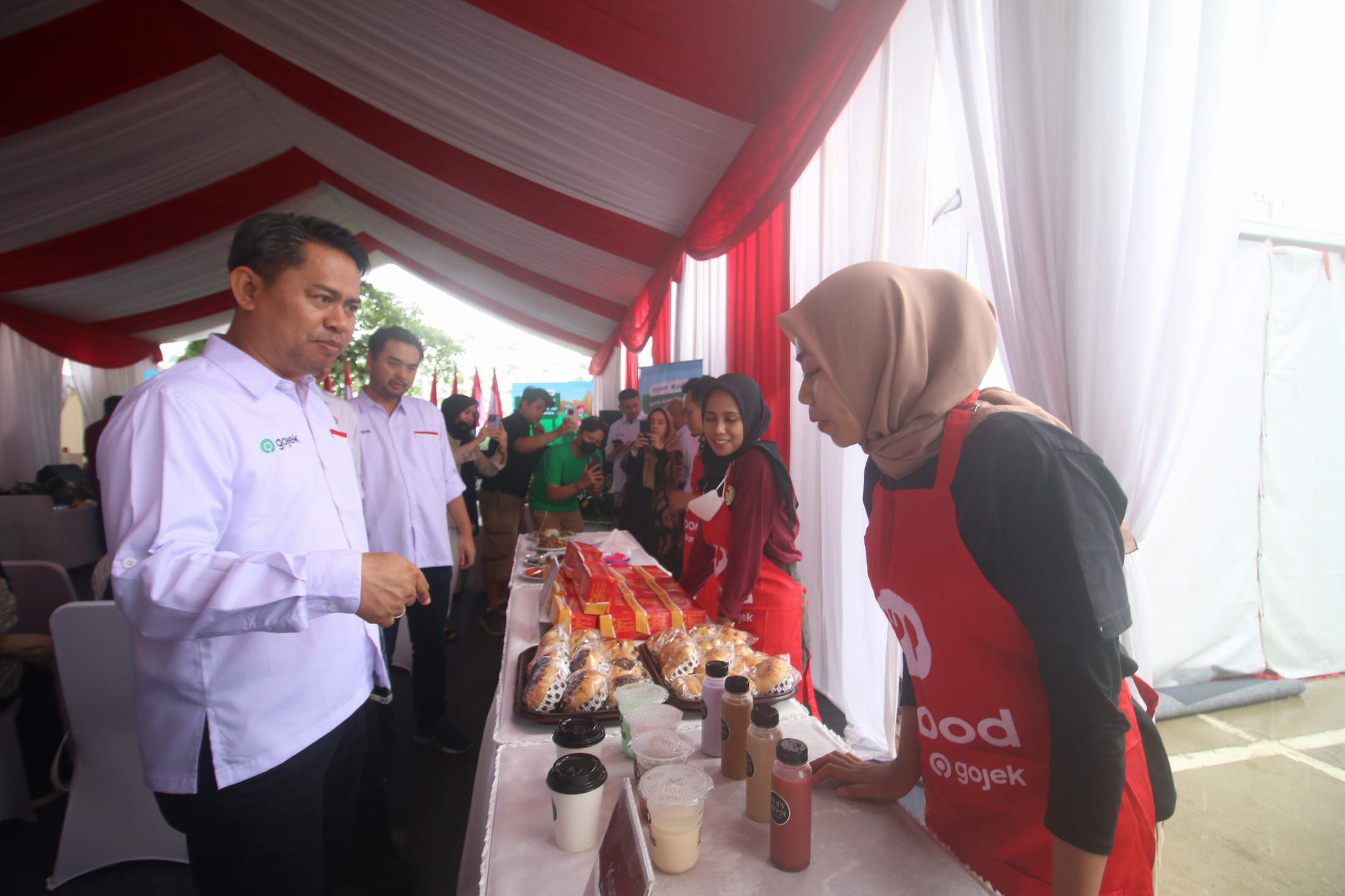 EKSPANSI: Manajemen Gojek dan Gopay bersama pemerintah daerah melakukan kick off layanan di Kawasan Ibu Kota Nusantara, (7/6).