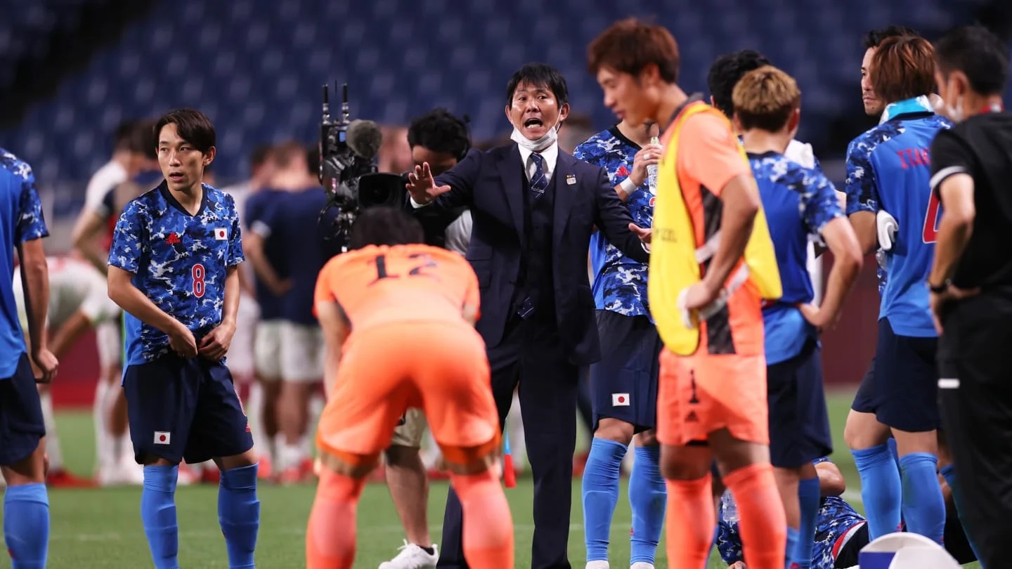 Pemain dan pelatih timnas Jepang. (FIFA via Getty Images)