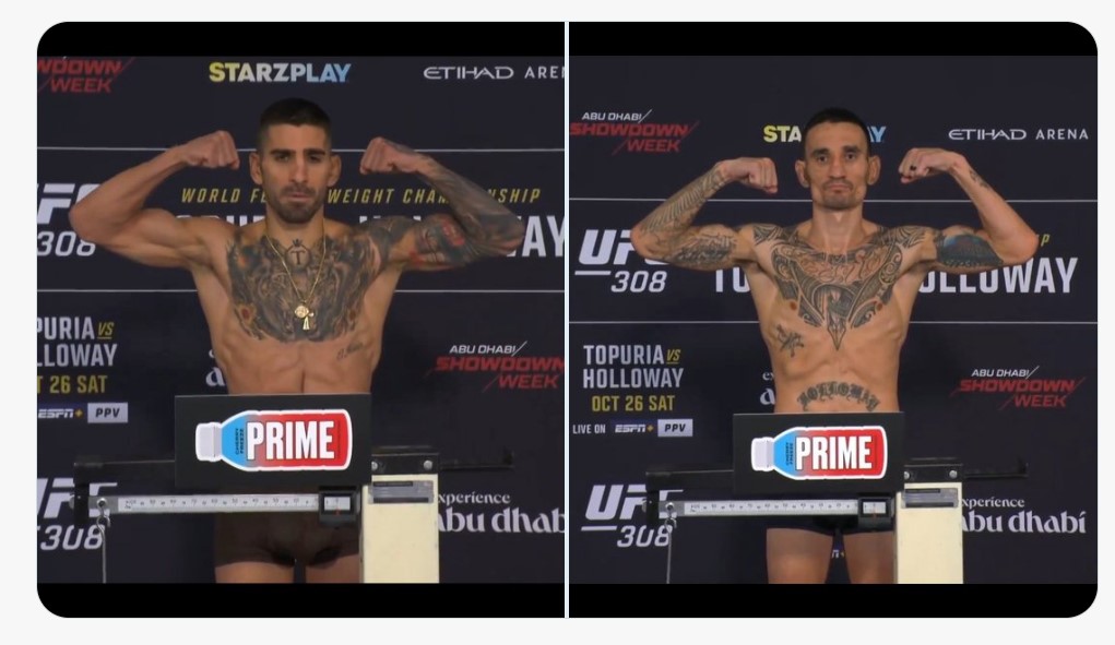 Ilia Topuria (kiri) dan Max Holloway saat sesi timbang badan.