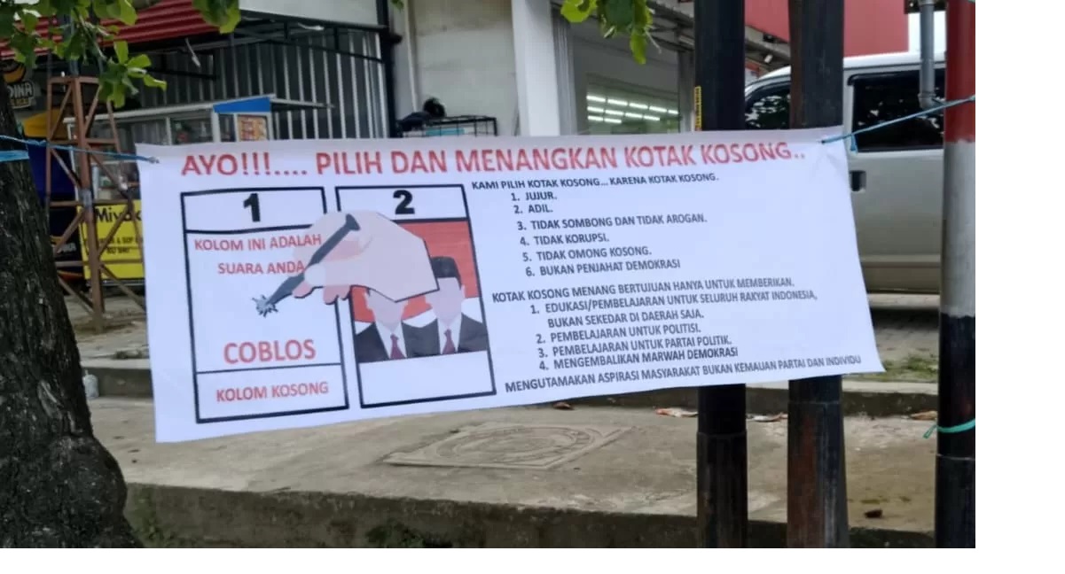 KOTAK. Spanduk ajakan memilih kotak kosong terlihat di Jalan Pahlawan, Samarinda Ulu. (kis)