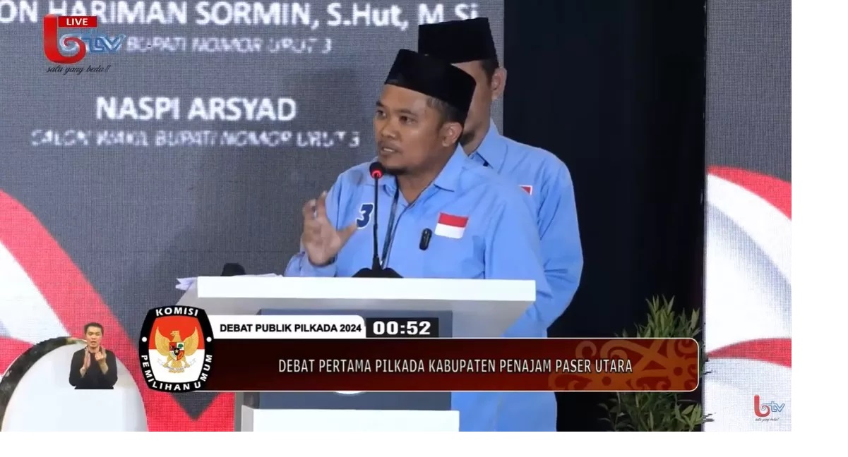 Paslon nomor urut tiga, Desmon Hariman Sormin dan Naspi Arsyad, mengemukakan pentingnya digitalisasi dalam memperbaiki tata kelola pemerintahan yang transparan. (tangkapan layar YouTube Btv)