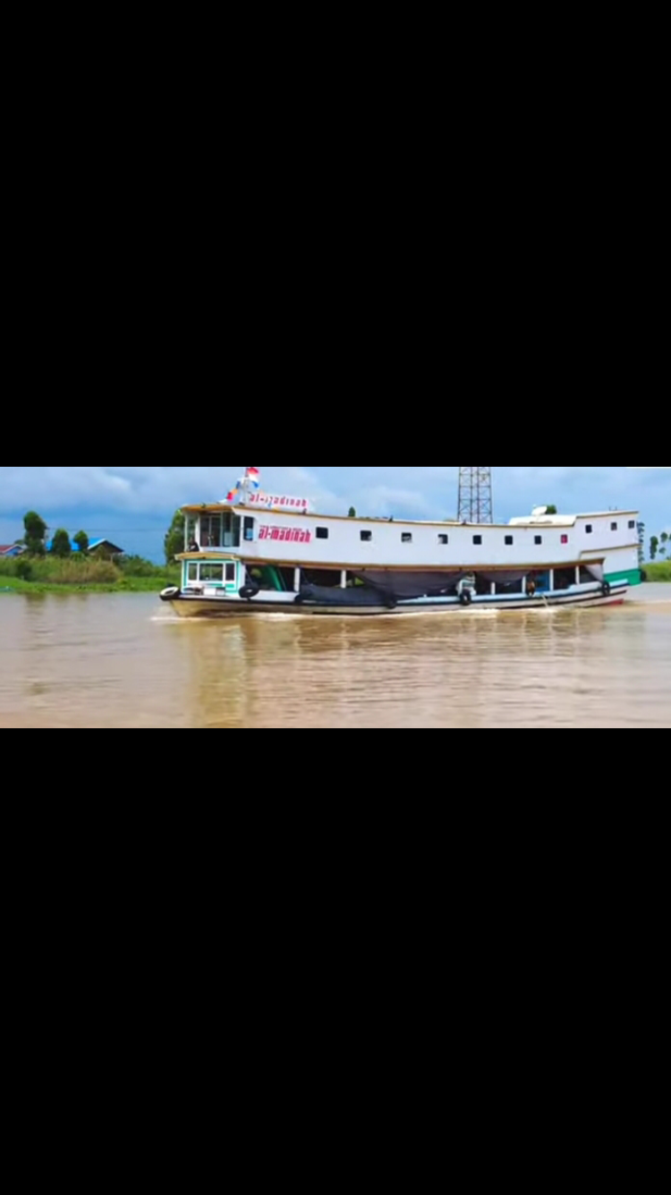 Ilustrasi kapal motor di Sungai Mahakam.