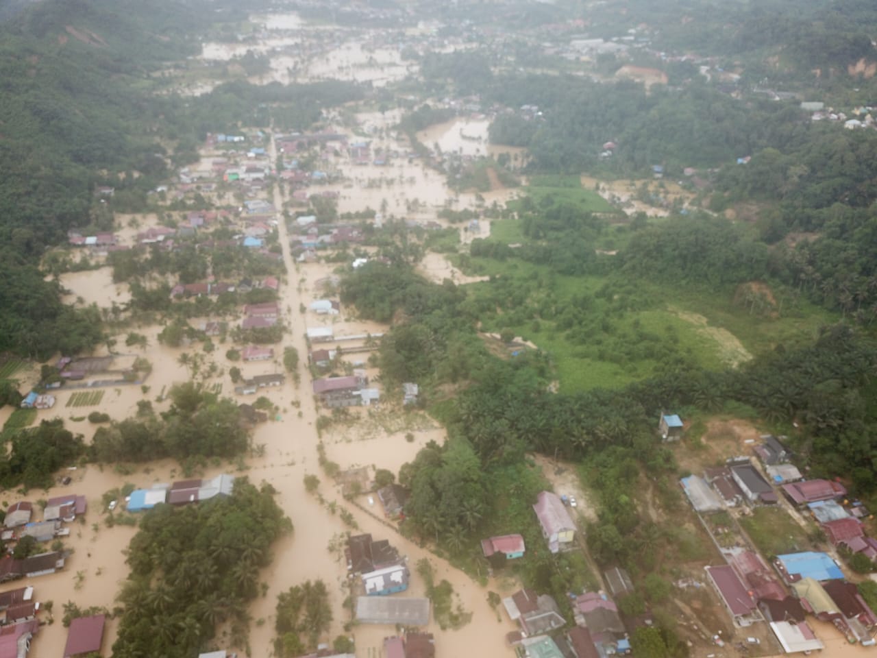 Penampakan banjir di Desa Purwajaya, Kecamatan Loa Janan dari atas (Ist/BPBD Kukar)