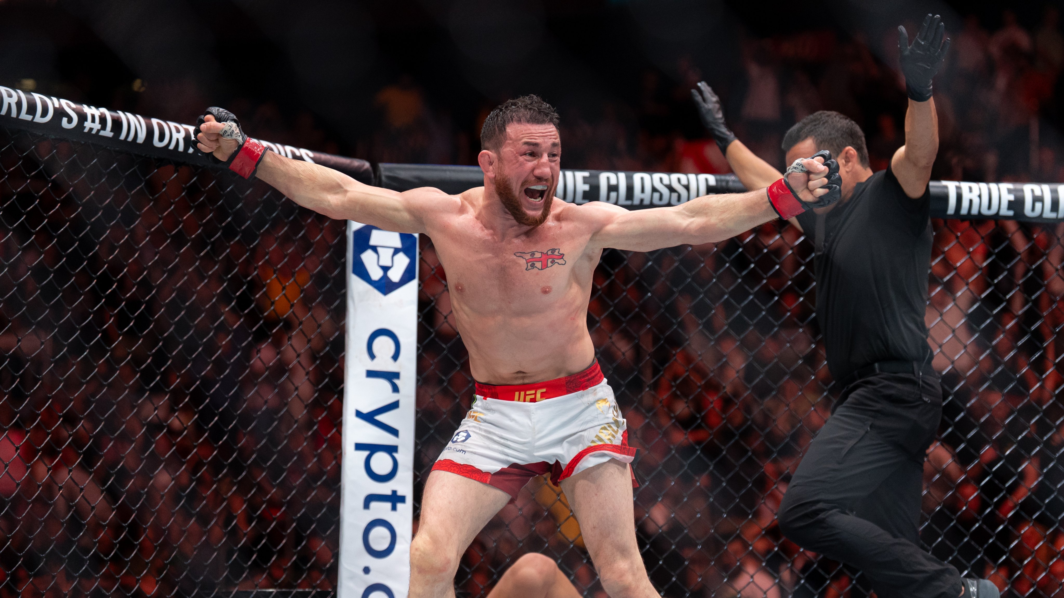 Merab rayakan kemenangan.