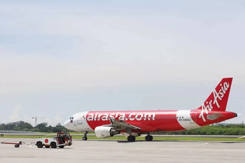 MENDARAT: Maskapai AirAsia akan melakukan penerbangan perdana rute internasional dari Banjarbaru-Kuala Lumpur pada Senin (20/10) mendatang. (Foto: AirAsia Newsroom)